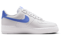 Nike Air Force 1 low sneaker in white with blue swoosh